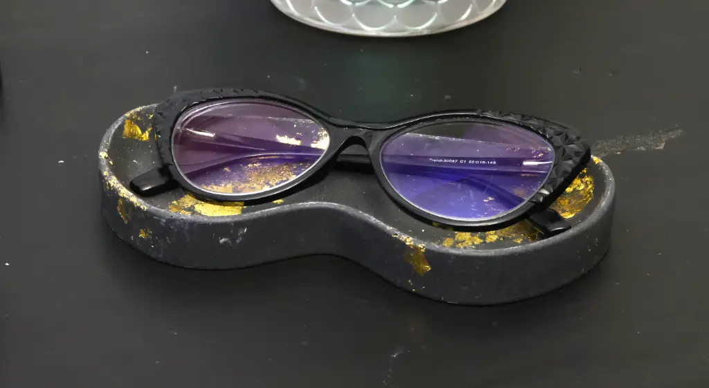 Porte Lunette Rond Noir/Or